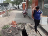 Hà Nội: Những hố ga trên vỉa hè, rình rập chờ 'nuốt' người đi bộ