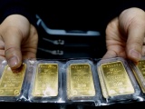 Đồng USD tăng vọt, giá vàng thế giới giảm sâu