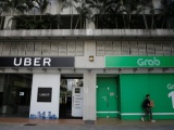 Grab và Uber bị phạt 9,5 triệu USD tại Singapore do vụ sáp nhập