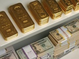 Đồng USD suy yếu, giá vàng chạm ngưỡng 1.200 USD/ounce