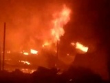 TP.HCM: Cháy nhà kho hơn 1.000m2 bị thiêu rụi, 13 căn nhà bị cháy lan