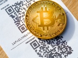 Giá bitcoin tăng vượt ngưỡng 7.000 USD