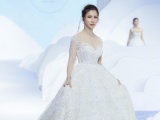 Hoa hậu Loan Vương mặc váy cưới đính hàng ngàn viên pha lê