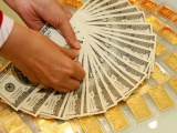 Giá vàng và ngoại tệ ngày 20/11: Vàng và USD đều trầm lắng