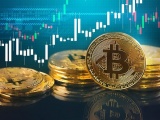 Giá Bitcoin lên cao, vượt mức 55.000 USD