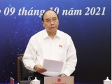 Chủ tịch nước Nguyễn Xuân Phúc: TP.HCM đã đi qua đỉnh dịch nhưng không được chủ quan