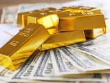 Giá vàng và ngoại tệ ngày 18/11: Vàng tăng tiếp, USD chững lại