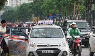 Xe ô tô kinh doanh vận tải hành khách bằng taxi phải có phù hiệu 'XE TAXI'